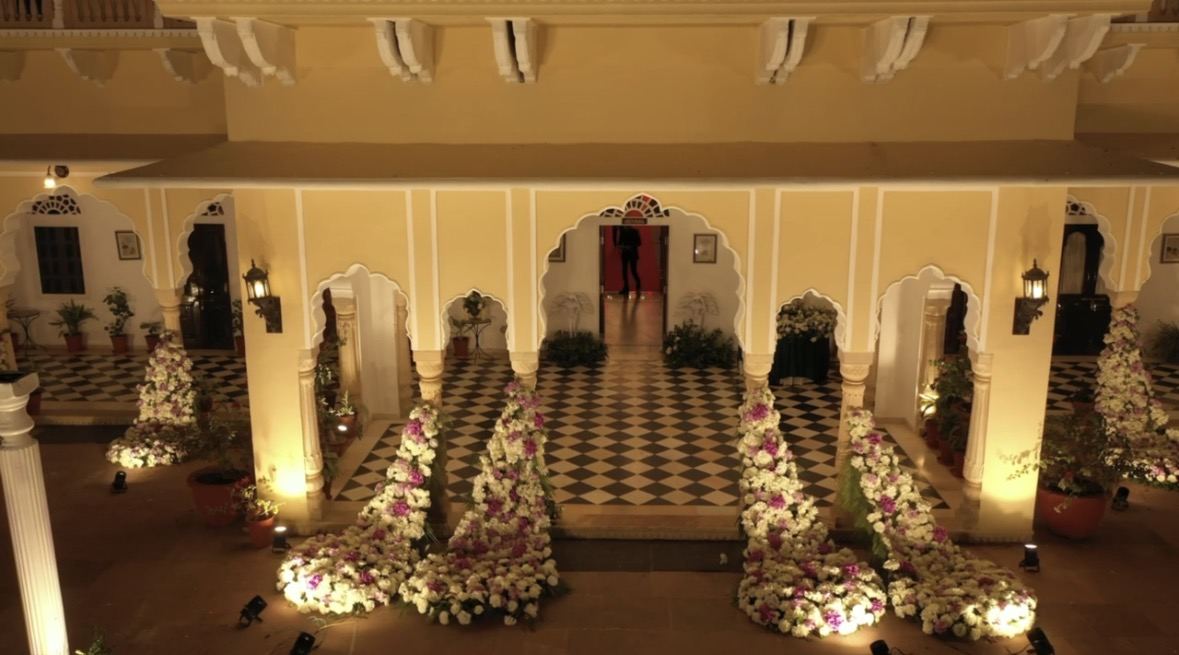 Celebration space dressed with drapes and floral detail